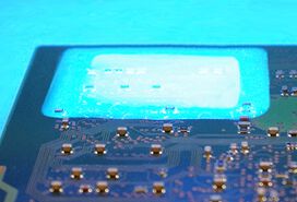 Fluorescent adhesive as conformal coating on a PCB | © Panacol