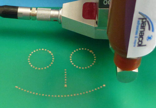 electrically conductive adhesive from Panacol jetted onto PCB circuit board