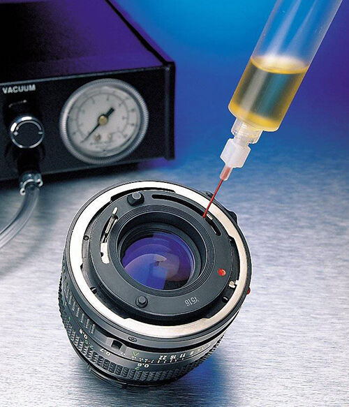 Lens is glued from dispenser to lens with glue from Panacol