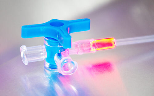 medical valve with tube glued with fluorescent adhesive from Panacol
