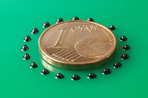 heat curing glue from Panacol jetted onto PCB as glop top dots